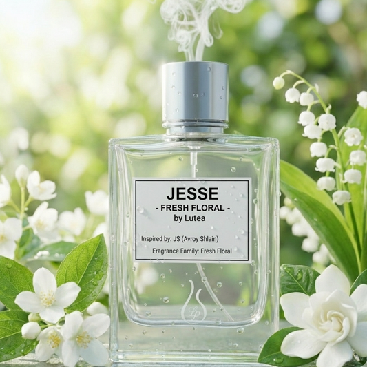 Perfume bottle labeled 'Jesse Fresh Floral' by Lutea with flowers in the background