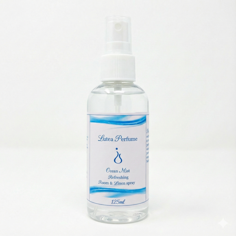 Clear spray bottle labeled 'Lutea Perfume' on a white background Ocean Mist 125 ml
